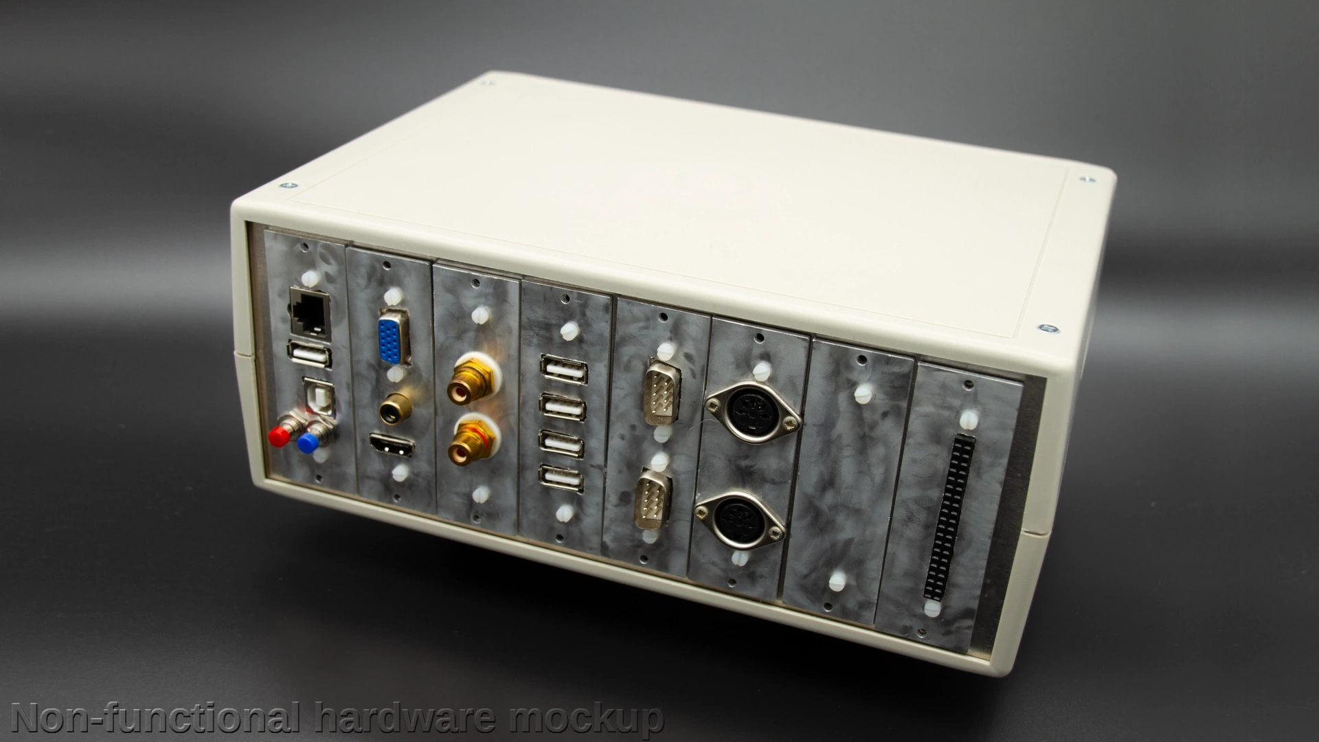 A rendering of a computer with a slotted design, having 8 slots with several connectors on them.